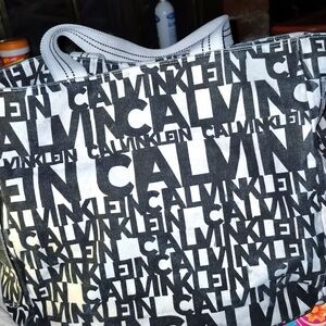 Black and white Calvin Klein name bag